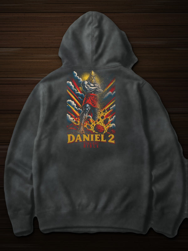 Straight Bible Daniel 2 graphic hoodie in garment-dyed Pepper, back print flat lay on dark wood with the Daniel 2 statue and stone art