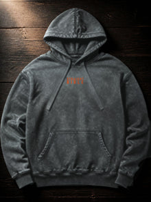 Straight Bible At Thy Word Tishbite 850 vs 1 hoodie in garment-dyed Pepper, front flat lay with orange Straight Bible chest print
