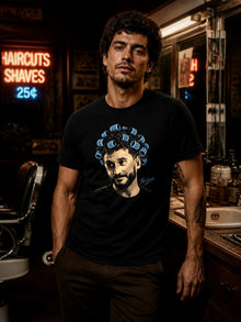 Man wearing the Play With My Emotions bootleg tee in a retro barbershop, TopLobsta underground streetwear
