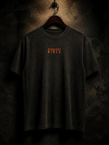 Front view of the Straight Bible At Thy Word Tishbite T-shirt in washed black with chest print