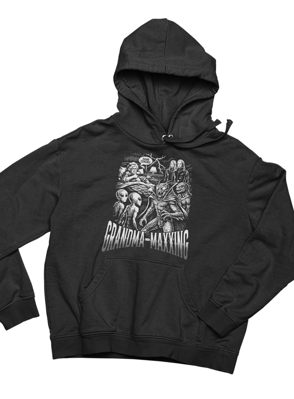 Grandma-Maxxing Hoodie by Nephilim Death Squad – grandma with a shotgun in bed facing aliens and demons with DAMN DEMONS speech bubble
