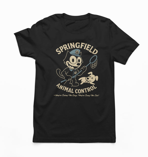 Springfield Animal Control T-Shirt by TopLobsta – rubber-hose cartoon cat officer over a knocked-out dog with THEY'RE EATING THE DOGS text