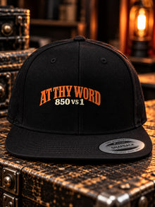 At Thy Word embroidered black snapback hat, front view