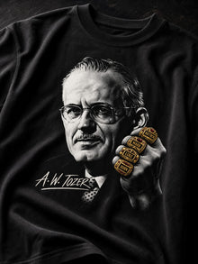 Close-up of the A.W. Tozer print: black-and-white portrait in glasses holding up a fist with four gold Gospel championship rings and signature lettering