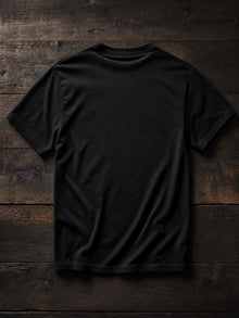 Back view of the black Charles Spurgeon Preach the Gospel T-shirt, plain back with the sermon-poster print on the front only