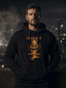 Man wearing the black Fear Not World Tour hoodie by Nephilim Death Squad on a night rooftop, orange FEAR NOT WORLD TOUR chest print