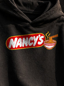 Nancy's Ramen Co. Hoodie by Nephilim Death Squad: black hoodie front print detail