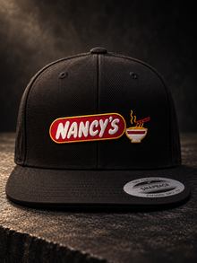 Nancy's Ramen Co. Embroidered Snapback: black YP Classics 6089M front view, Nancy's Ramen embroidery