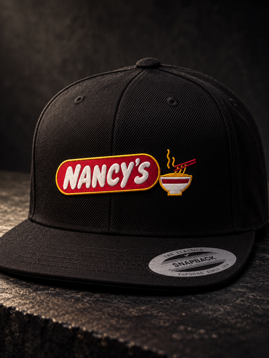 Nancy's Ramen Co. Embroidered Snapback: black YP Classics 6089M three-quarter, embroidered logo and ramen bowl