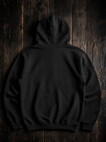 Back view of the black NDS Youth Group Summer Camp 2025 hoodie, plain back with the print on the front only