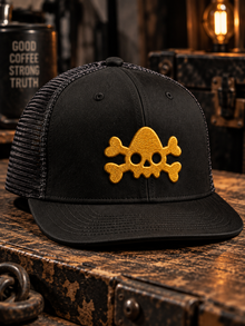 Skull of Goliath Bundle: Tee + Hat – Black Nephilim Death Squad logo trucker hat with the gold embroidered NDS skull and