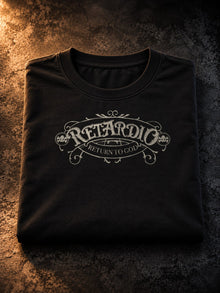 R*tardio black T-shirt folded, crest print showing