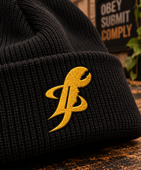 Close-up of TopLobsta black ribbed beanie, yellow TL claw embroidery on cuff
