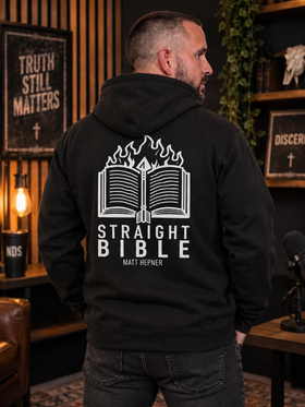 Man wearing Straight Bible hoodie, back flaming Bible graphic in studio