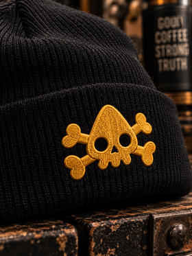 Black NDS logo beanie with yellow embroidered skull on cuff, flat lay
