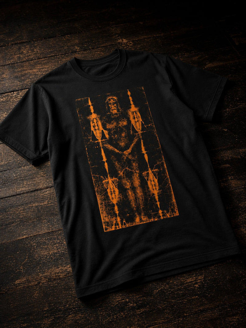 Black Shroud of Turin T-shirt by Nephilim Death Squad: full-length shroud figure in burnt orange inside an ornamental frame