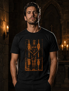 Man wearing the black Shroud of Turin T-shirt by Nephilim Death Squad in a candlelit stone chapel