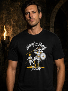 Man wearing the black Skull of Goliath T-shirt by Nephilim Death Squad, David vs. Goliath skeleton giant graphic on the chest