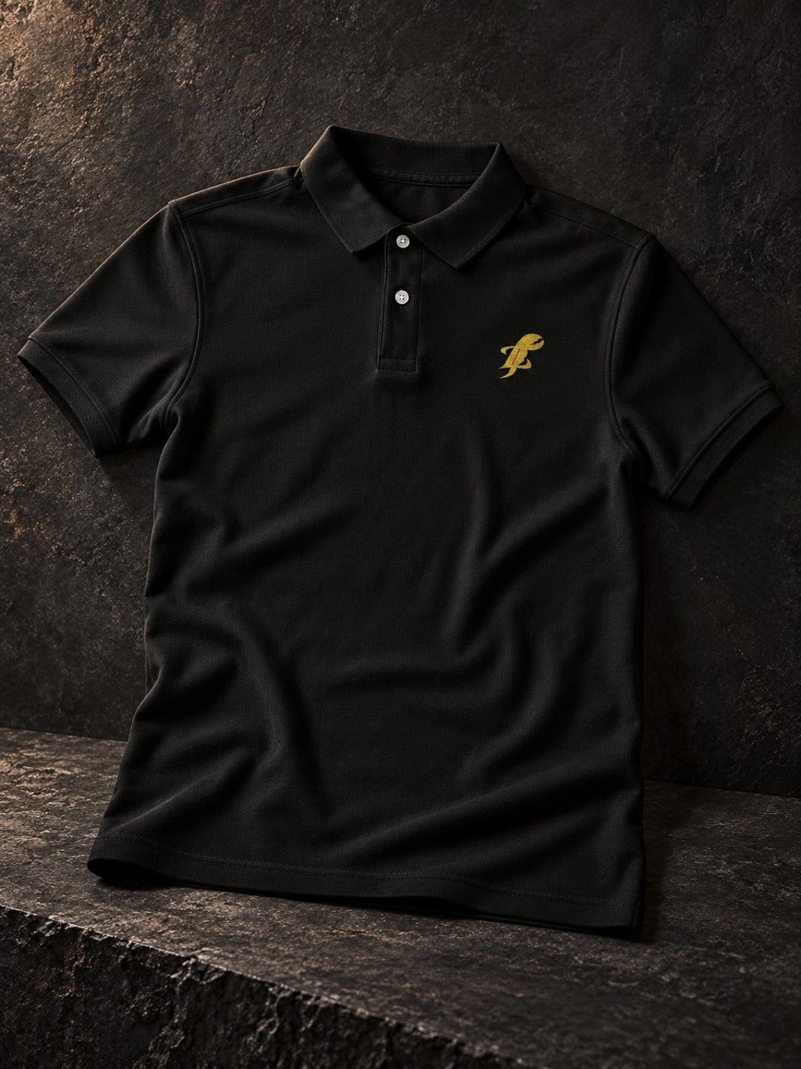 TopLobsta black polo shirt with gold embroidered lobster logo – editorial product view