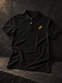 TopLobsta black polo shirt with gold embroidered lobster logo – editorial product view
