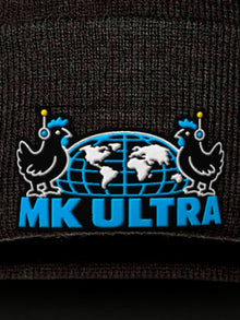 Worldwide MK Ultra Free-Range Chickens Pom-Pom Beanie: black Sportsman SP15 pom-pom beanie embroidery close-up, embroidered MK Ultra headset chickens and globe