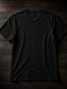 Back view of the black Y'all Tribbin' T-shirt, plain back with the rapture print on the front only